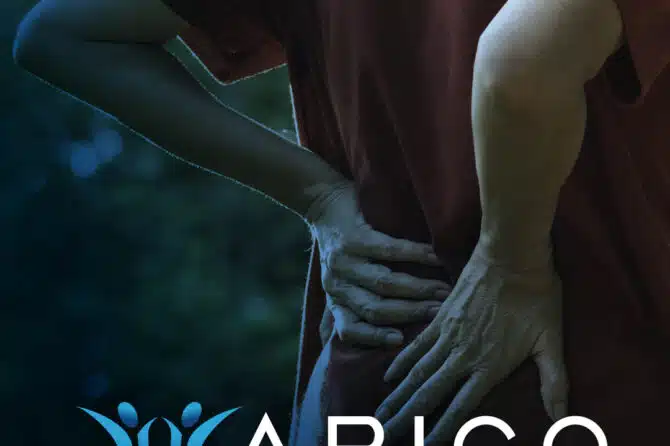 Image of a woman holding her back in pain, with text reading Had Enough Pain?