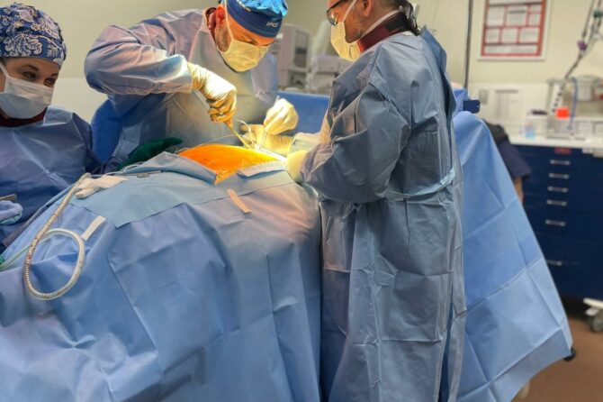 Photo of Dr. Abdallah implanting a newly developed Spinal Chord Stimulator
